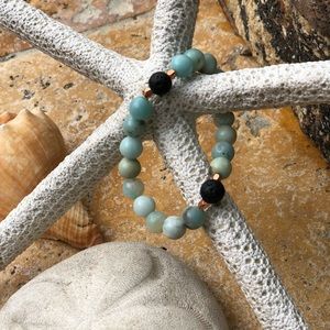 Hand made real lava and gemstone bracelets .